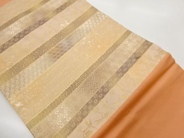 横段に笹蔓緞子・古典柄模様織出し名古屋帯